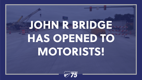 Blue box with text that John R Bridge has opened to motorists