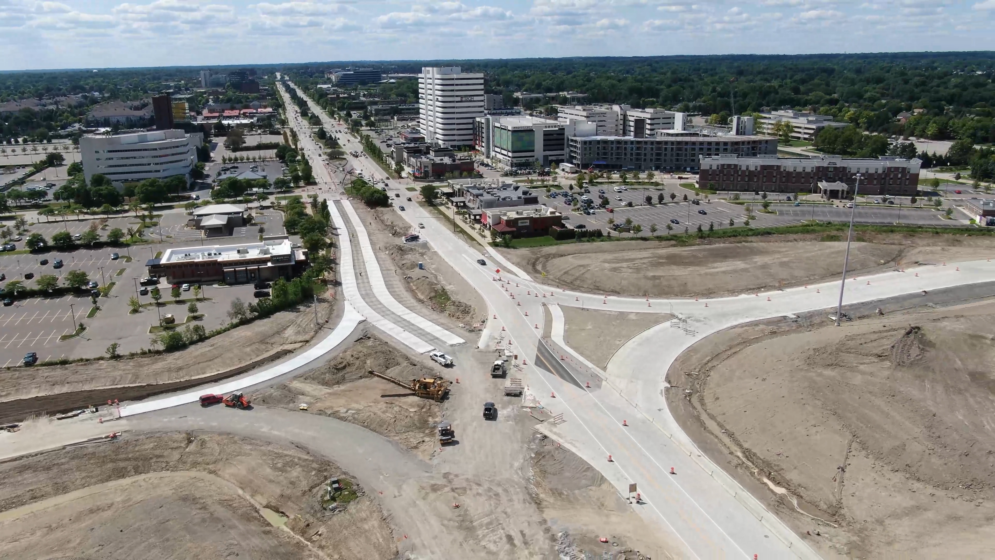 Aerial view of Big Beaver Road looking west.  Reconstruction of roadway interchange showing the base of the roadway in process.